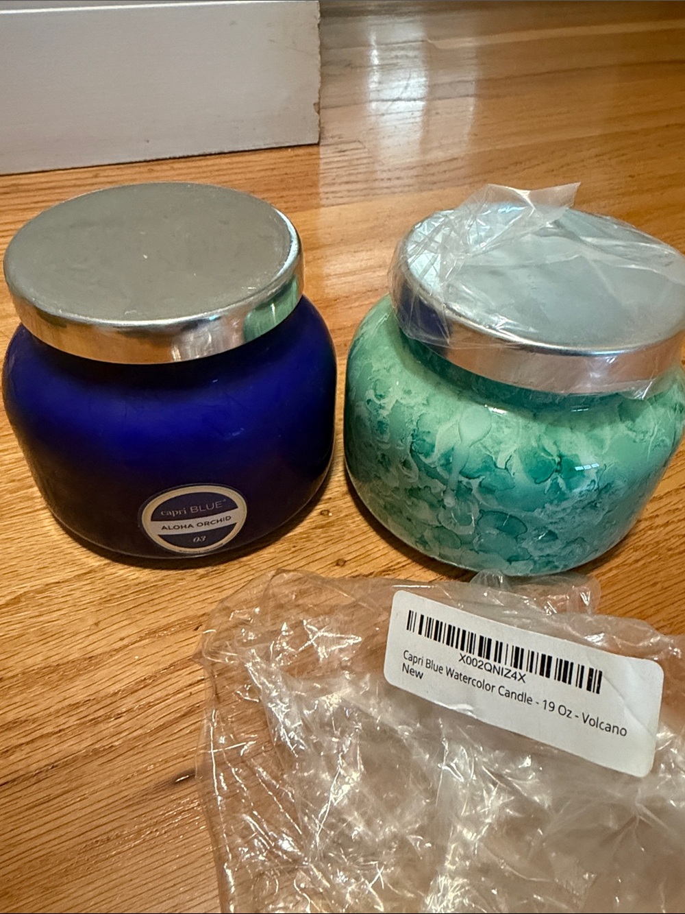 Two New Capri Candles- Volcano and Aloha Orchid each 19 ounces